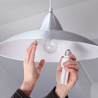 Person fitting light bulb